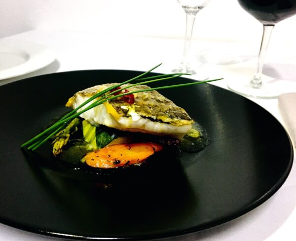 Lomo de bacalao con salsa de miel y naranja